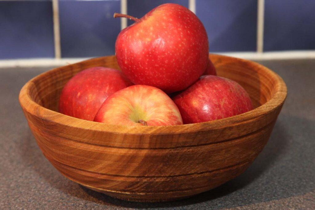 You can eat from a wooden bowl like this handmade cherry bowl.