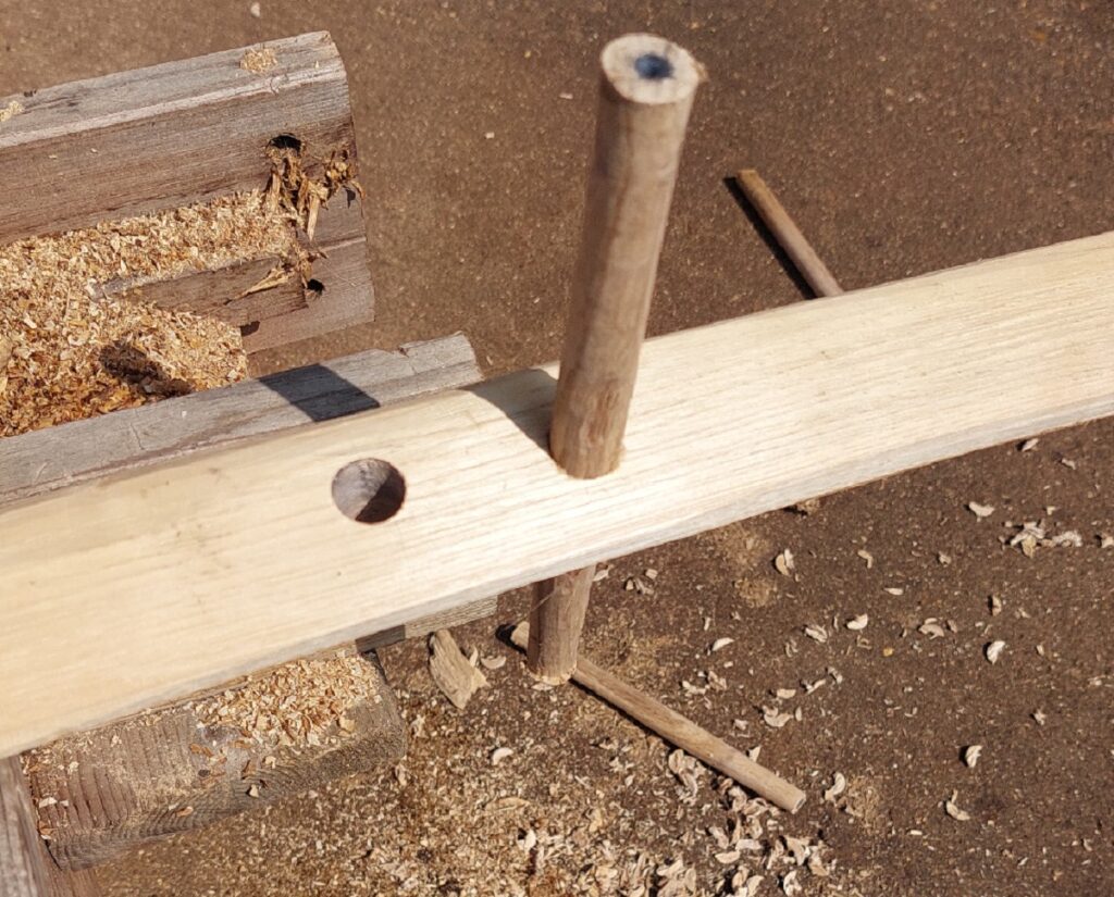 Pole-lathe bugee support and oak peg